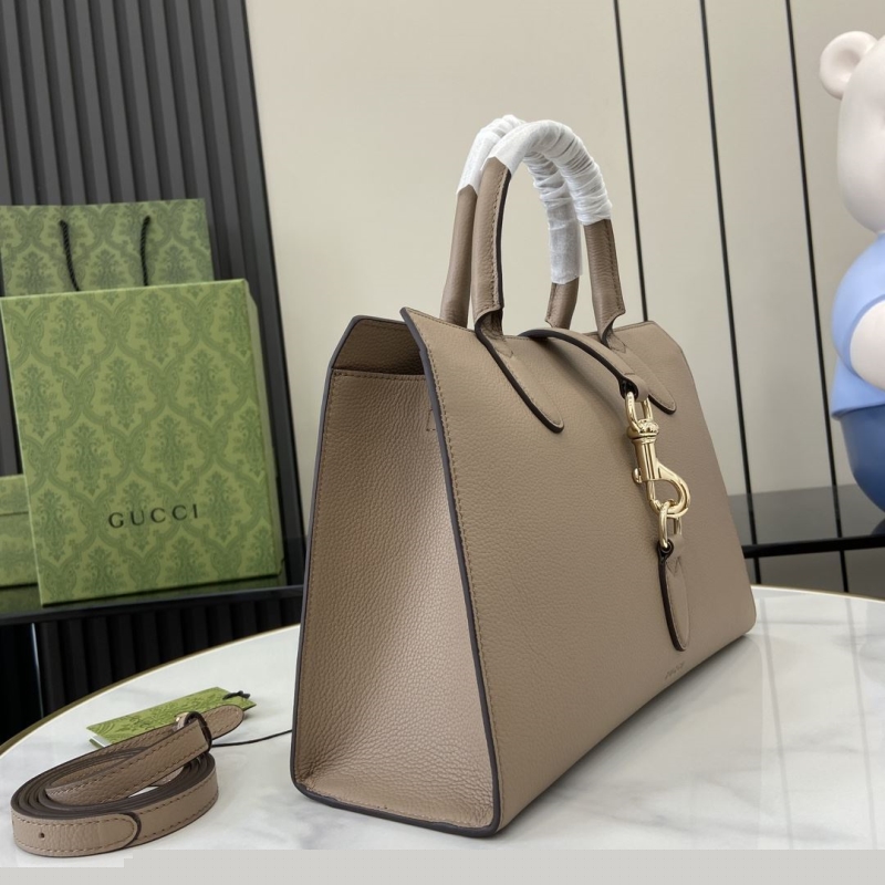 G*u*i top handle bags
